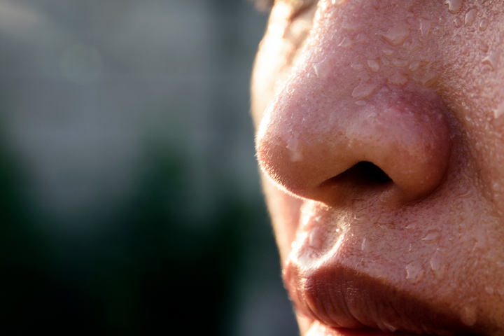 Close-up of face with sweat.